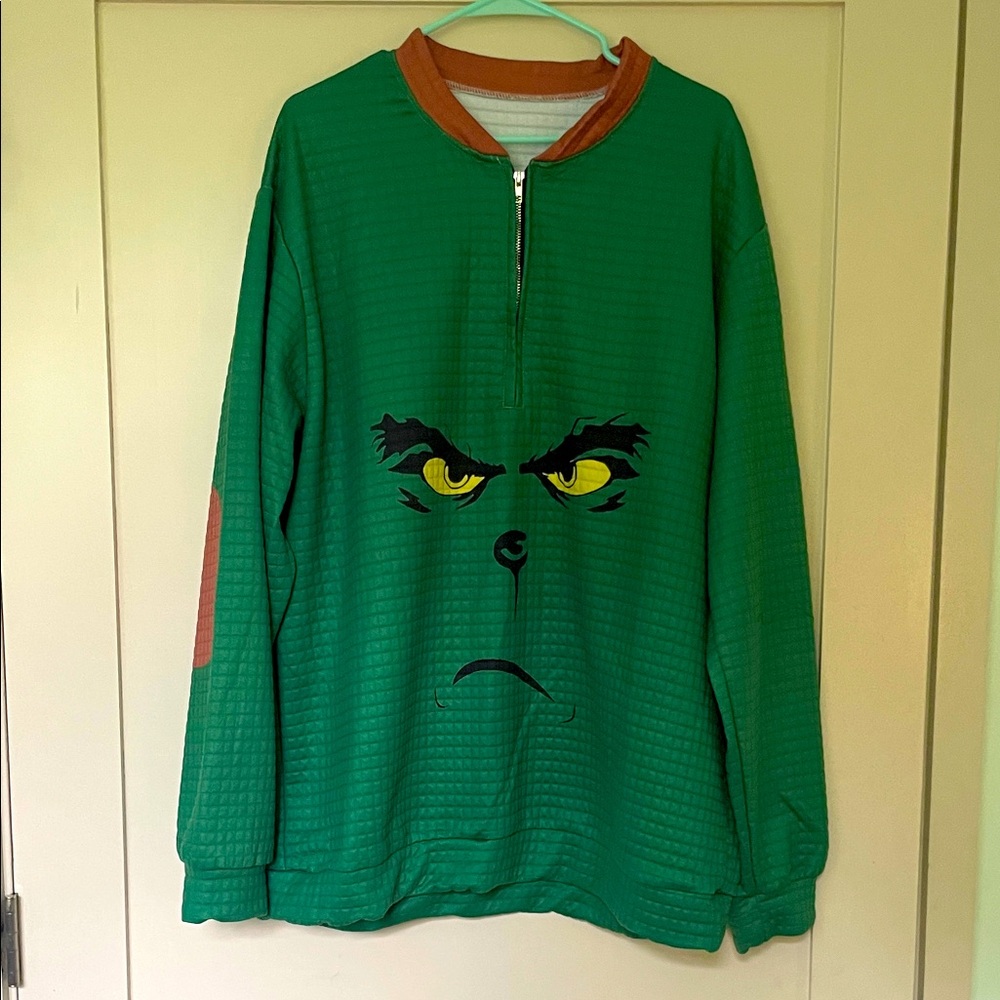 Green Grinch Face Pullover with Yellow Accent